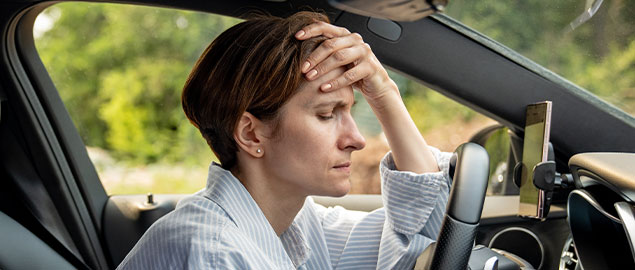Woman suffering from migraines after car accident Denver