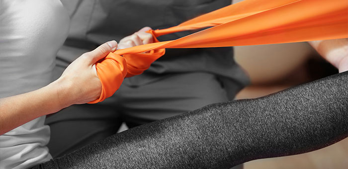 Patient receiving Therapeutic Exercise in Denver for auto accident injury